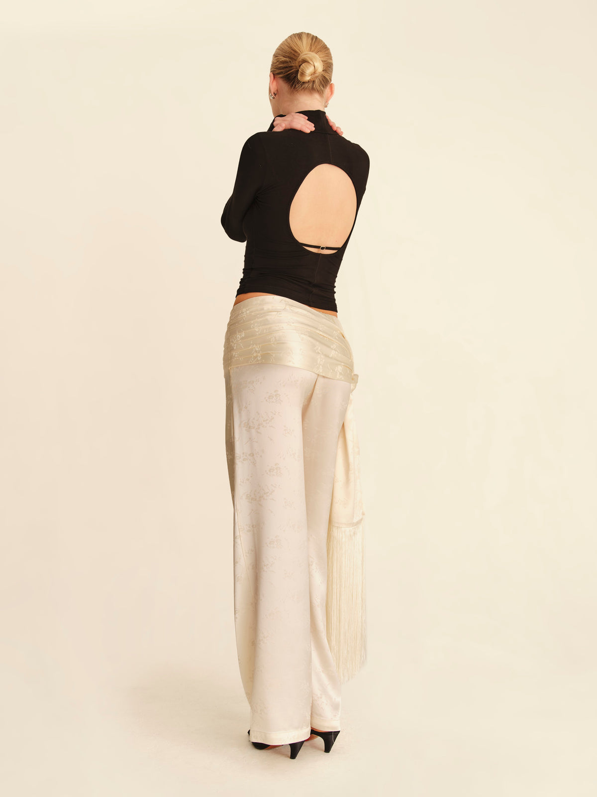 Vesper Backless Turtleneck Top 2.0 Jet Black - full-length back view, evening styling